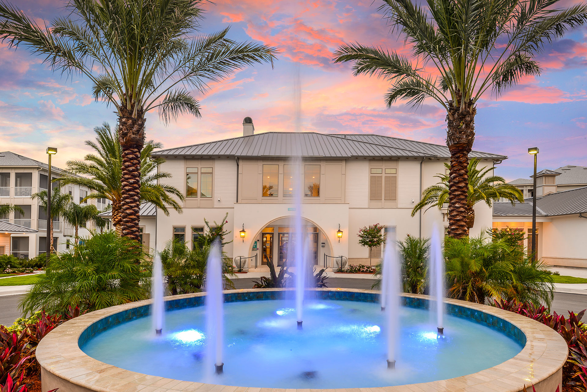 Multi level luxury apartment with fountain and palm trees