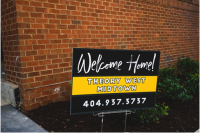 Welcome Home sign for Theory West Midtown Multifamily Student Housing by Summit Contracting Group