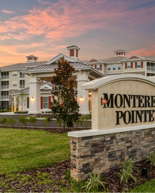 Senior Living facility in afternoon with facility name sign