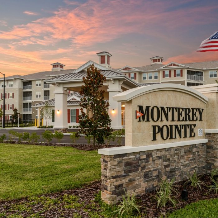 Senior Living facility in afternoon with facility name sign