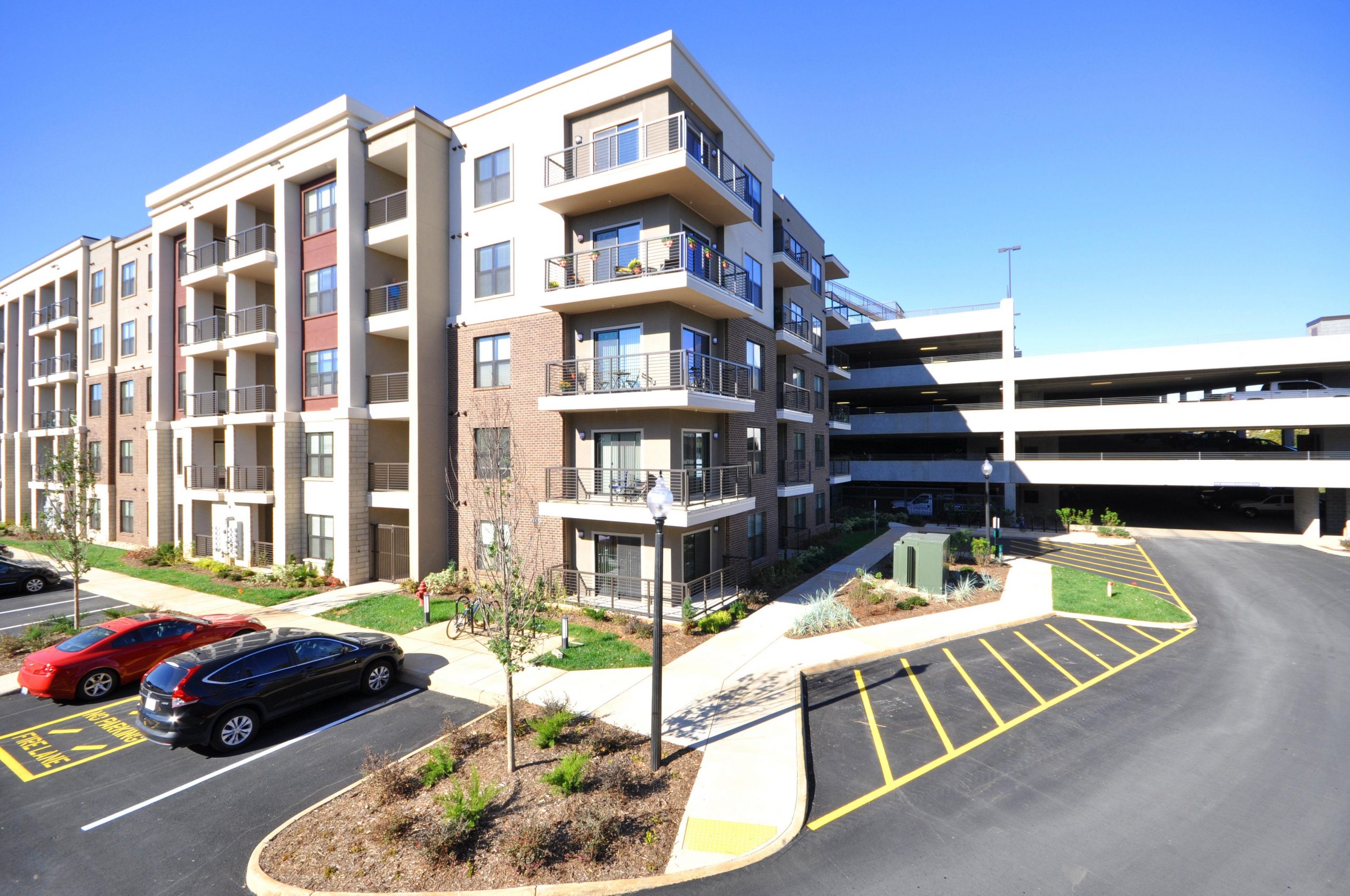 Multi story apartment complex with garage