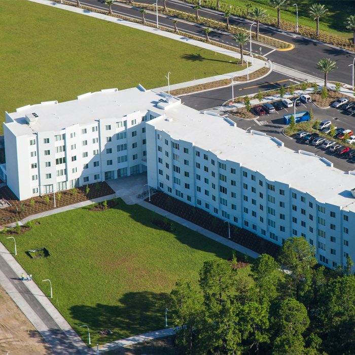 Student housing white multi story facility aerial view