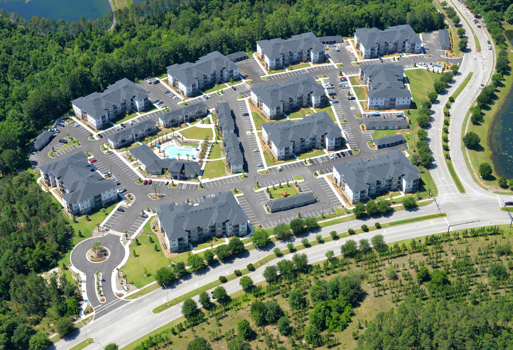 Gran Bay Apartments aerial view of complex and parking lot