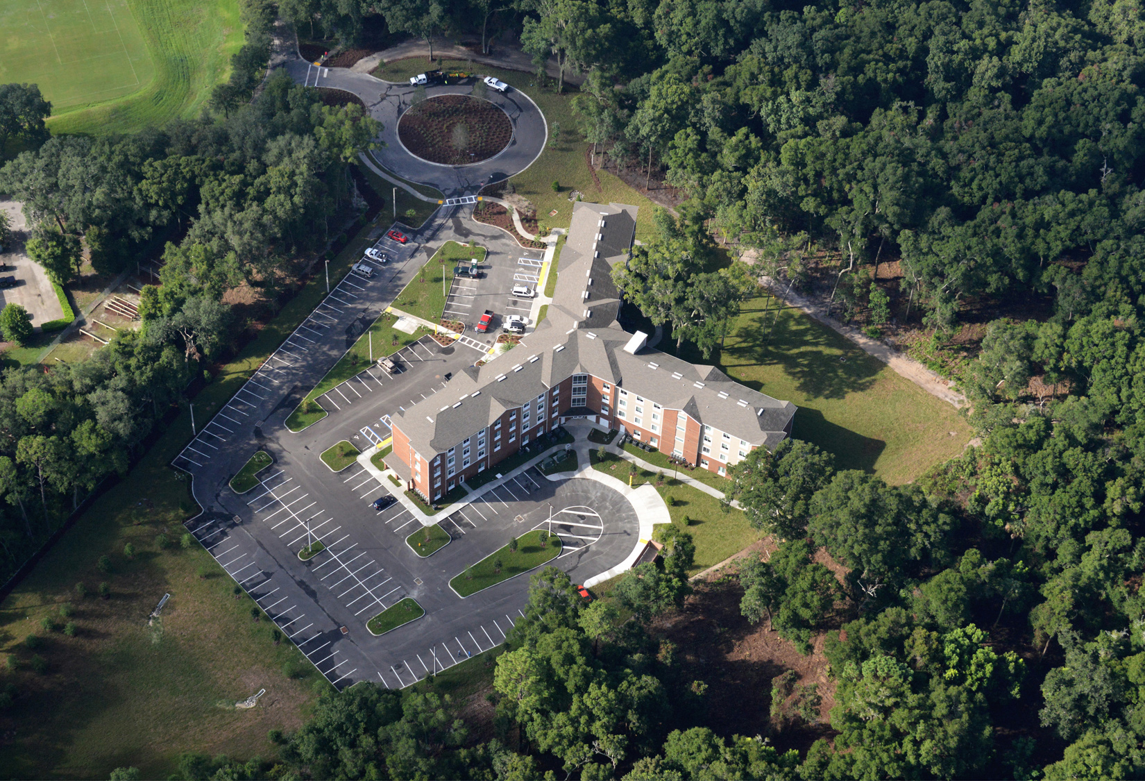 aerial shot of brown student housing complex