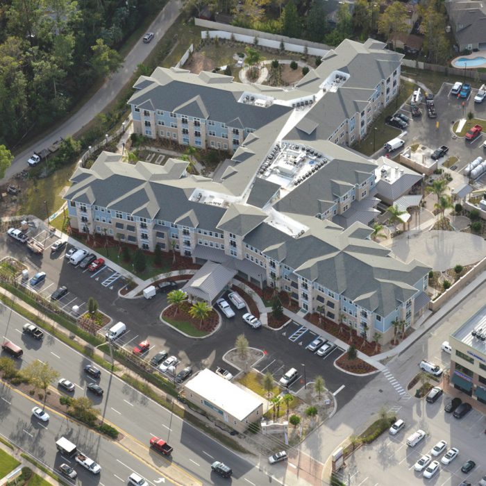 Senior living facility aerial view of complex and parking lot