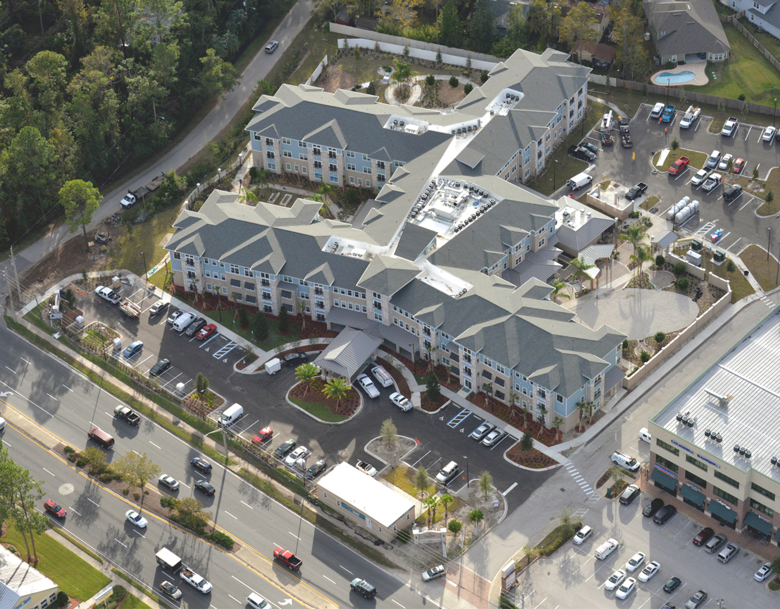 Senior living facility aerial view of complex and parking lot