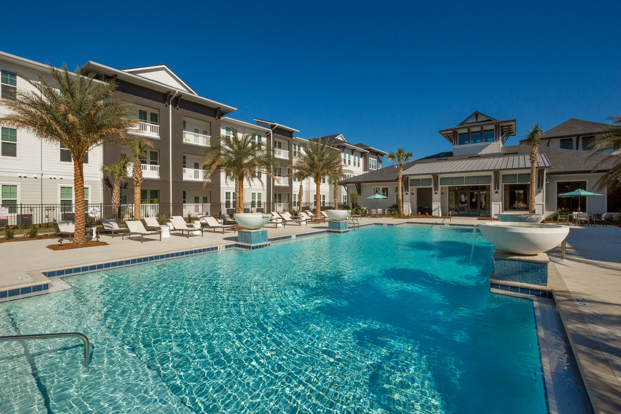 luxury multi level apartment complex pool area