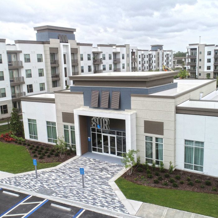 Multi level apartments with main office and SUR sign