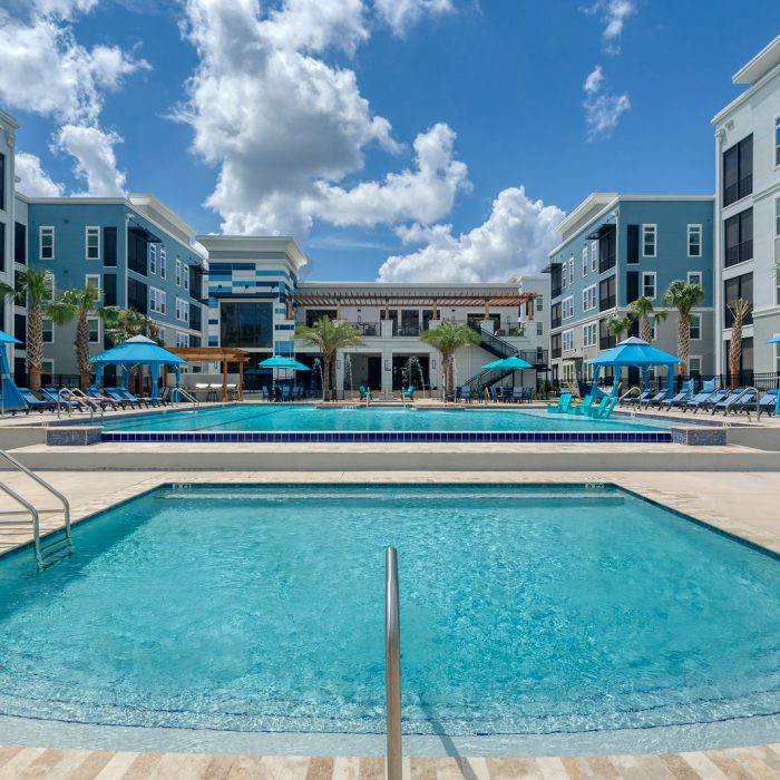 Multi story luxury apartments large open pool area