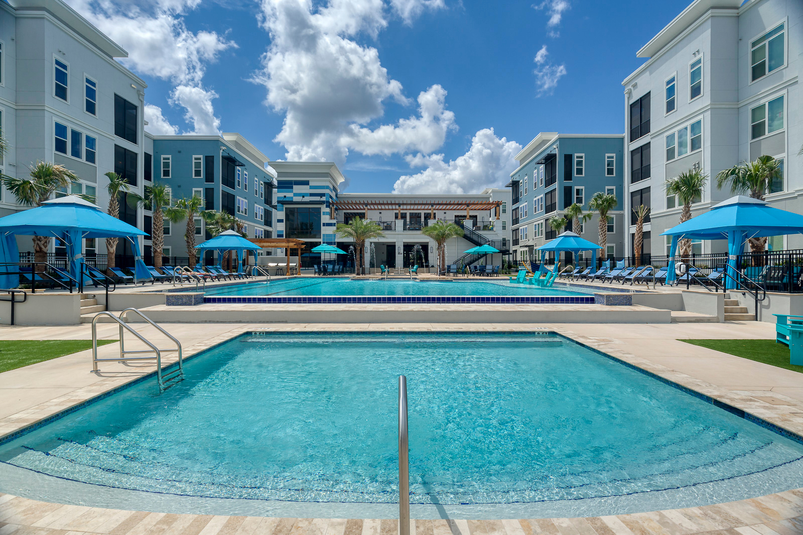 Multi story luxury apartments large open pool area