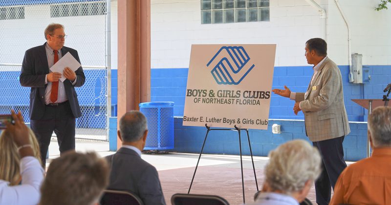 Man speaking to crowd for Boys & Girls Club Project by Summit Contracting Group