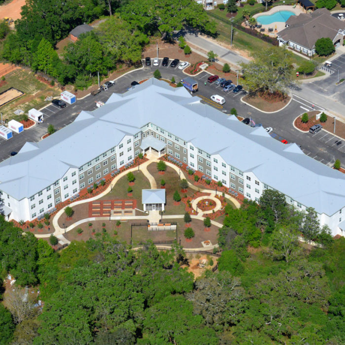 aerial view of 3 story apartments building