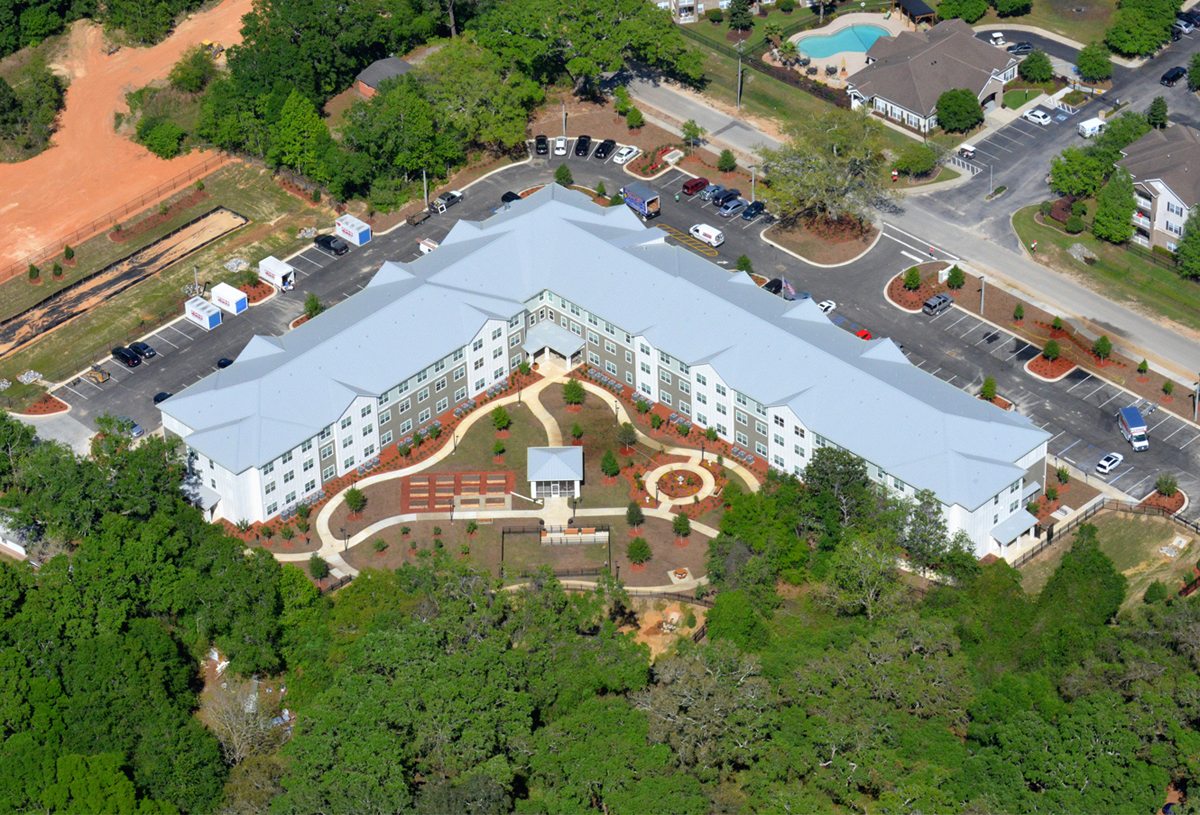 aerial view of 3 story apartments building