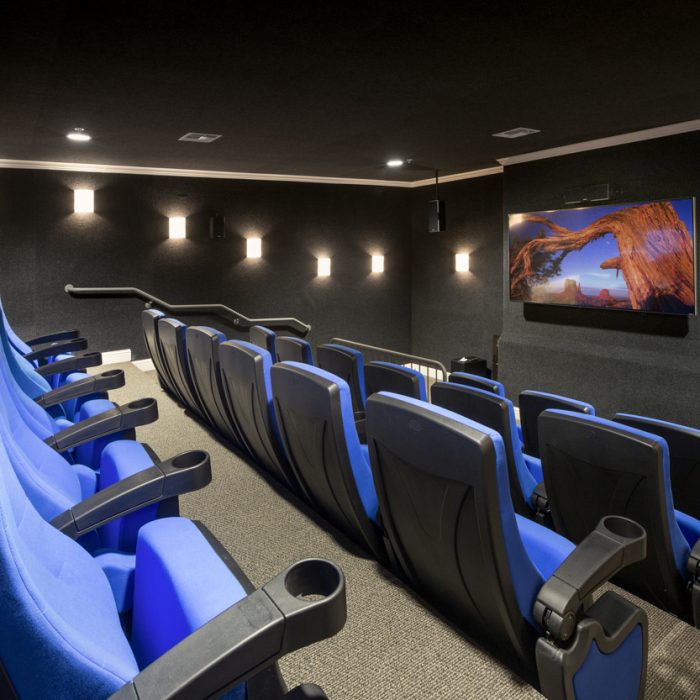 Luxury theater room for Madison Crossing Market Rate Senior Living Apartments by Summit Contracting Group