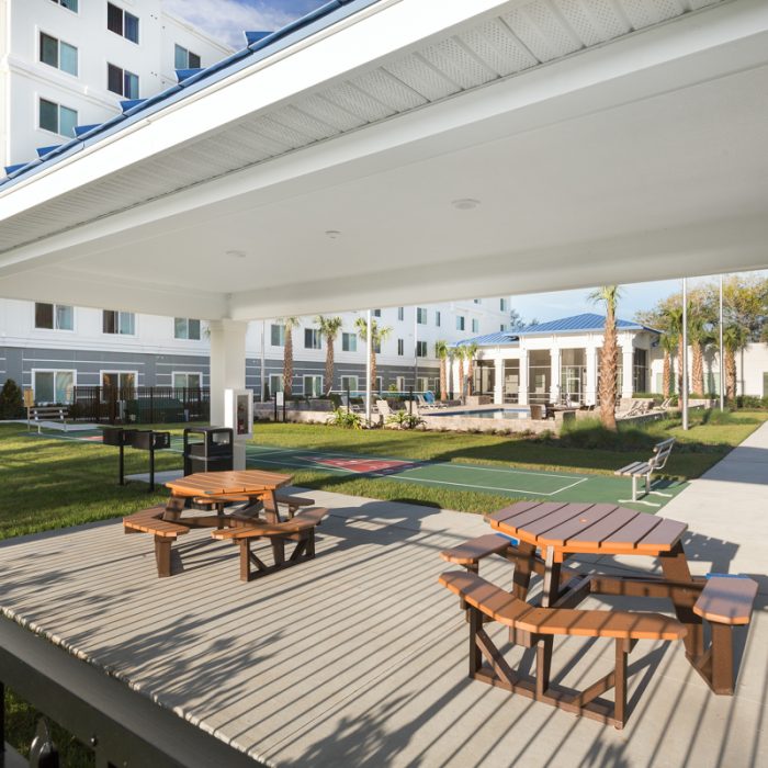 Madison Crossing Market Rate Senior Living Apartments sitting area under gazebo