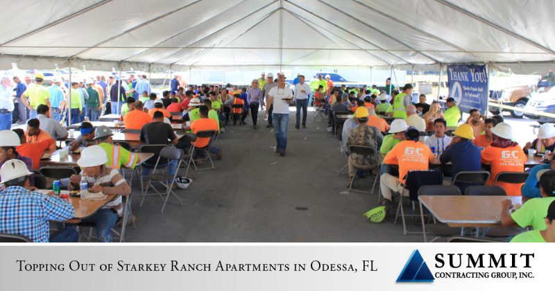 Construction workers eating at Volaris Starkey Ranch Market Rate Apartments Top Out