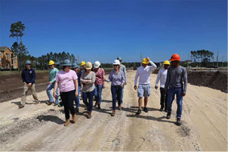 Students participating in the UNF Construction Management Program Tour with Summit Contracting Group