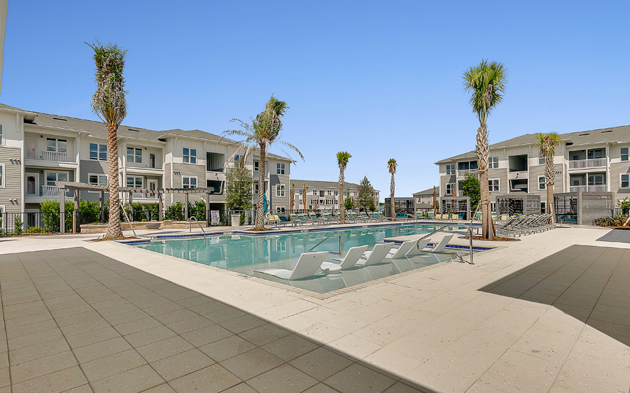 Swimming pool and apartment buildings at Beachwalk apartments