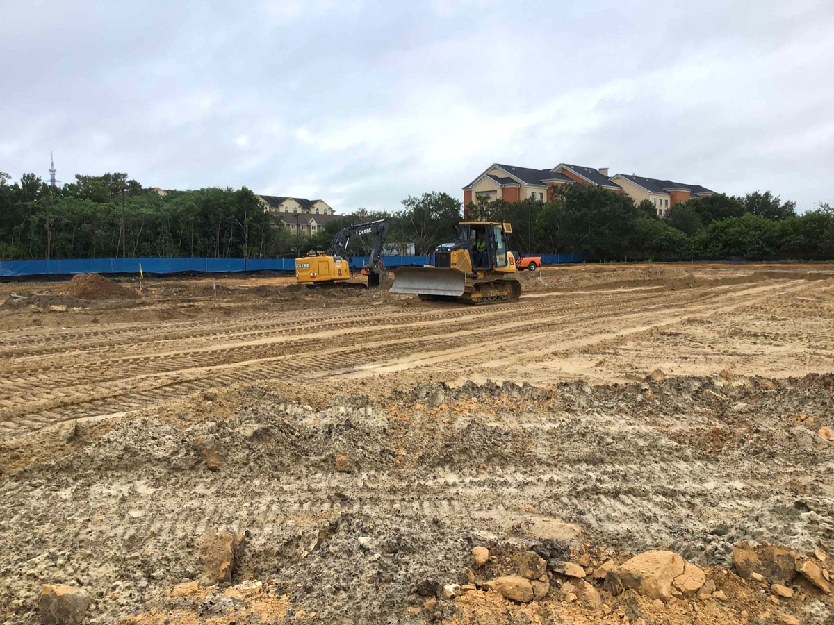 bulldozers moving dirt at Republic Square construction site