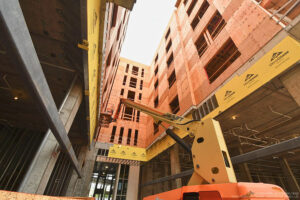 crane and large apartment building under construction