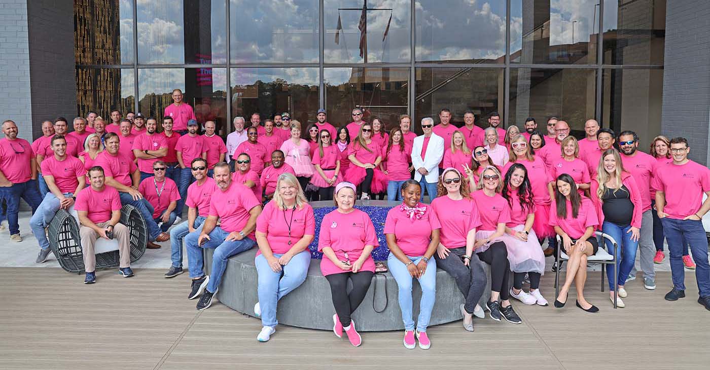 Summit Contracting Group wearing pink for Breast Cancer Awareness