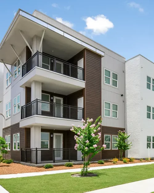 3 story apartment building with balconies