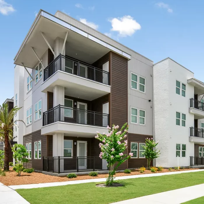 3 story apartment building with balconies