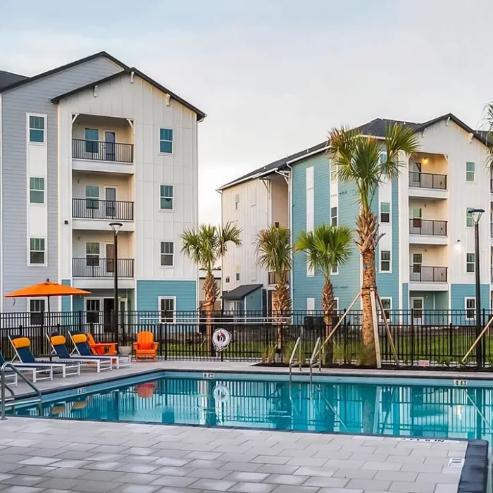 4 story apartment building with pool