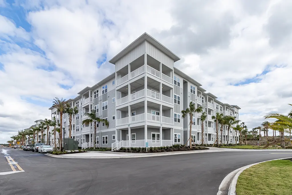 4 story apartment building with balconies