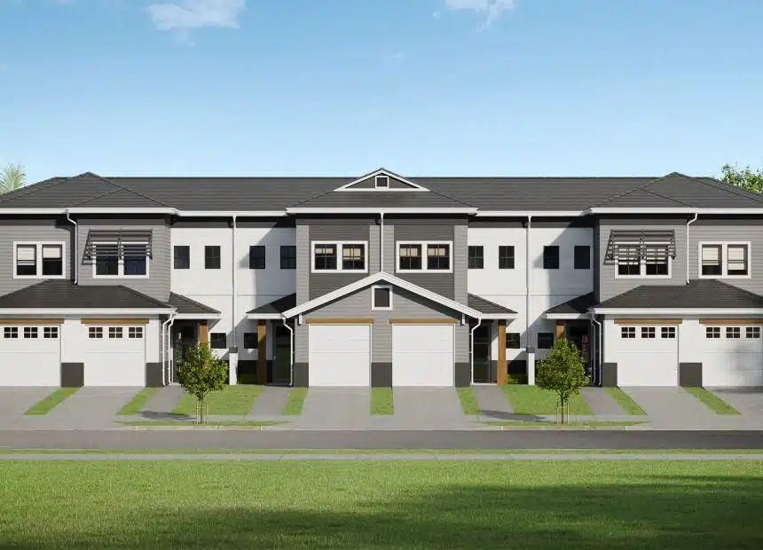 architect's rendering of a 2 story townhouse building with a garage on the first floor